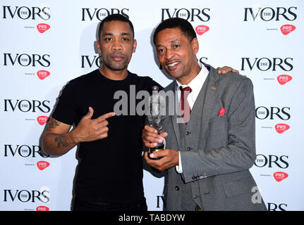 Wiley (left) and Richard Kylea Cowie with the Ivor Inspiration Award during the Annual Ivor Novello Songwriting Awards at Grosvenor House in London. Stock Photo