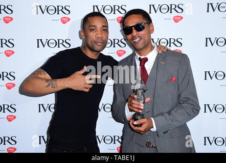 Wiley (left) and Richard Kylea Cowie with the Ivor Inspiration Award during the Annual Ivor Novello Songwriting Awards at Grosvenor House in London. Stock Photo