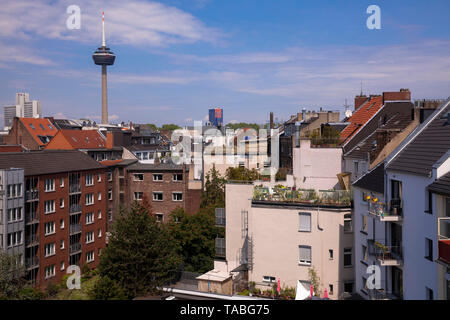 view over the roofs of the houses in the Belgian Quarter to the Colonius television tower, Cologne, Germany.  Blick ueber die Daecher der Haeuser im B Stock Photo