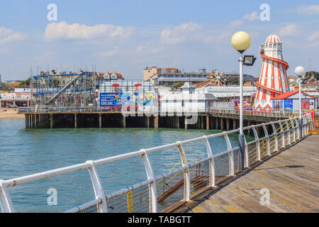 Beach promenade and amusement Pier at Clacton on Sea on the Essex coast ...