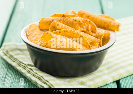 Rolled tortilla chips in bowl. Stock Photo