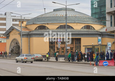 Moscow, Russia - March 23, 2019: Subway station lobby Elektrozavodskaya. Majority of people wait for the public transport. There are information signs Stock Photo
