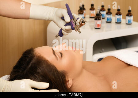 Bio oxidation therapy. Woman in the beauty salon during rejuvenation procedure. Stock Photo