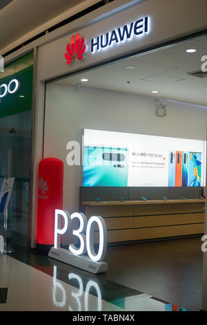 A Huawei mobile phone outlet within a Philippine shopping mall. Huawei are considered as one of the top selling mobile phone brands in the country. Stock Photo