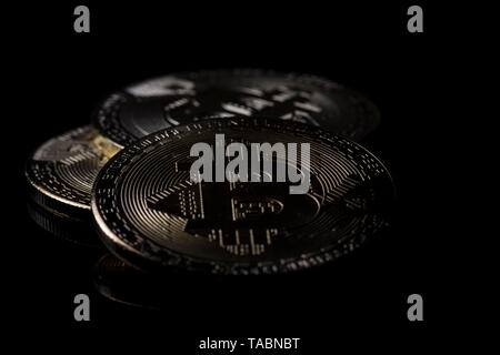 Panoramic view bitcoin close up isolated on black background digital coins. Buying, trading and selling cryptocurrencies. Digital money financial Stock Photo