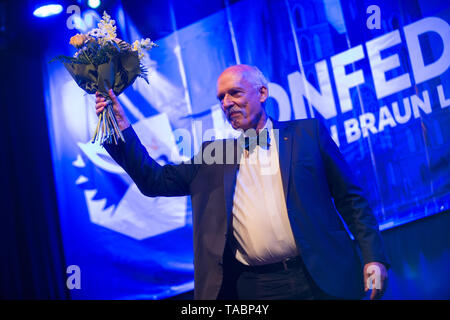 Janusz Korwin-Mikke, one of the Leaders of the far right and Euroscepticism Confederation Coalition seen with flowers during a campaign convention ahead of the EU elections. The Confederation coalition is composed by Janusz Korwin-Mikke, a popular public figure in mass media due to some controversial episodes like being suspended from the European Parliament after giving a Nazi salute during a speech, describing refuges who arrived in Europe in 2015 as human garbage. Stock Photo