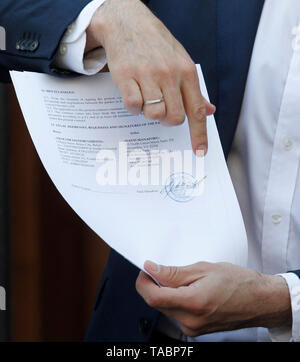 Originals of documents, which were returned from USA by the FBI after ending the Manafort case investigations, seen shown by Ukrainian lawmaker Serhiy Leshchenko before his visit to Prosecutor General Office in Kiev, Ukraine.  As Leshchenko said US political consultant Paul Manafort, journalist Larry King, and Svoboda Party in Ukraine received money from the so-called 'black ledgers' of the pro-Yanukovych Party of Regions during Presidential election campaign in 2010. On 14 May 2019, Ukrainian Prosecutor General Yuriy Lutsenko accused Leshchenko of interfering in the American elections in 2016 Stock Photo