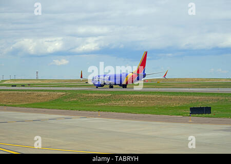 DENVER, CO -11 MAY 2019- View of an airplane from Southwest Airlines (WN) at the Denver International Airport, or DIA (DEN), at the foot of the Rocky  Stock Photo