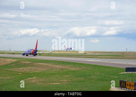 DENVER, CO -11 MAY 2019- View of an airplane from Southwest Airlines (WN) at the Denver International Airport, or DIA (DEN), at the foot of the Rocky  Stock Photo