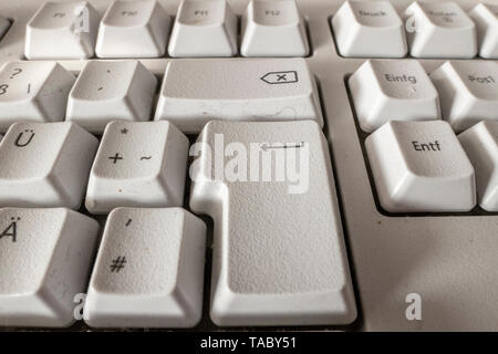 very dirty keyboard with the focus on the letters Stock Photo