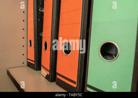 folders in different colors with red and green backs Stock Photo