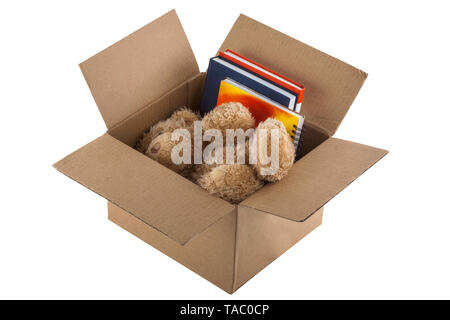 Teddy Bear in cardboard box isolated on white background Stock Photo