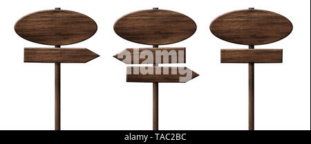 Different oval wooden direction arrow signposts or roadsigns made of dark wood Stock Photo