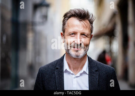 Portrait of mature businessman with greying beard Stock Photo