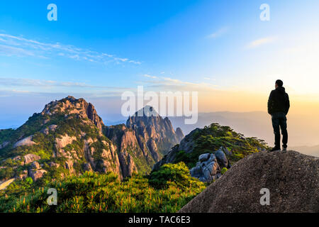 Man on top of mountain,conceptual scene Stock Photo