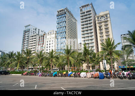 My Khe beach, Da Nang city, Vietnam - April 28, 2019: The seafront road (Vo Nguyen Giap Street) with the row of new multistory hotels on the left and Stock Photo