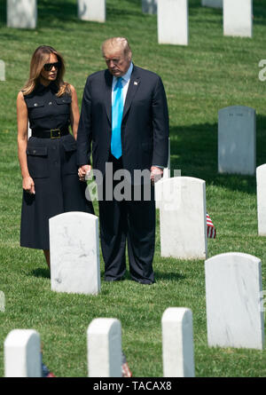Arlington, Virginia, USA. 23rd May, 2019. United States President Donald J. Trump and First Lady Melania Trump visit Arlington National Cemetery ahead of Memorial Day during the ''Flags-In'' ceremony, in Arlington, Virginia on May 23, 2019. ''Flags-In'' is an annual event where the 3rd U.S. Infantry Regiment, ''The Old Guard, '' places American flags at every gravesite at Arlington National Cemetery. Credit: Kevin Dietsch/Pool via CNP Credit: Kevin Dietsch/CNP/ZUMA Wire/Alamy Live News Stock Photo
