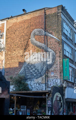 roa hanbury street crane Stock Photo