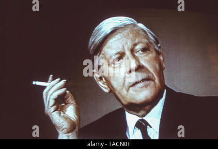 Helmut Schmidt - German politician and Chancellor of the Federal Republic of Germany from 1974-1982 pictured here smoking a cigarette, archive image taken ca 1985 Stock Photo