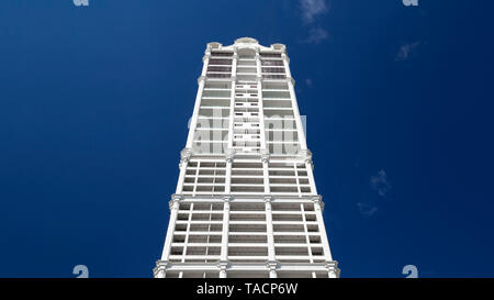 Tall skyscraper under deep blue sky Stock Photo