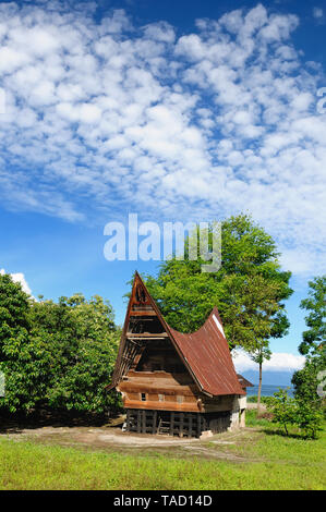 Traditional Batak style house at the Samosir island, Danau Toba, Indonesia, North Sumatra Stock Photo