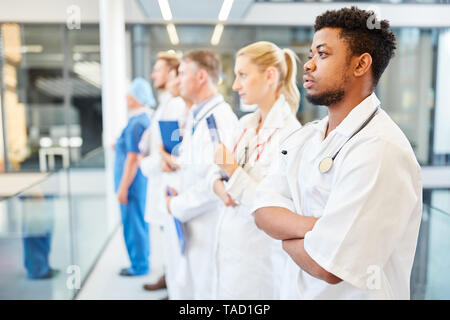 Multicultural medical team with doctors and nurses together in hospital Stock Photo