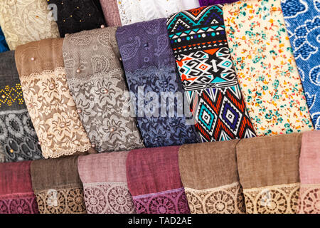 Assortment of colorful oriental shawls. Aqaba, Jordan Stock Photo