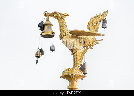 Thai golden swan statue on white background in thai monastery Stock Photo