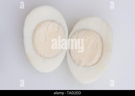 very pale almost white egg yolk in hard boiled egg cut in half Stock Photo