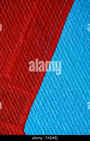 Red and blue art canvas background close up view Stock Photo
