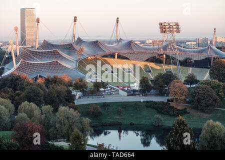Germany, Munich, Olympic Park, Olympic Stadium, tent roof construction in the morning light Stock Photo