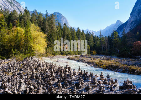 Austria, Tyrol, Karwendel mountains, Hinterautal, cairns at River Isar Stock Photo