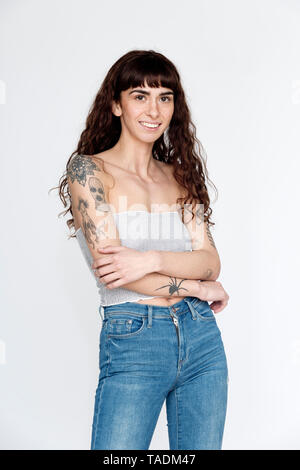 Portrait of tattooed young woman Stock Photo