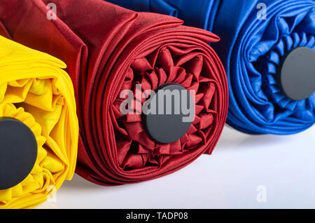 Multicolored compact umbrellas isolated on white Stock Photo