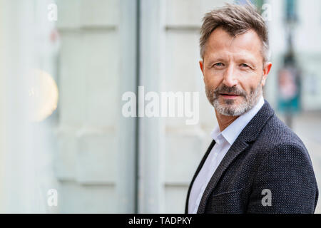 Portrait of mature businessman with greying beard Stock Photo