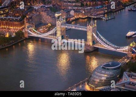 Tower Bridge and River Thames aerial view at magic hour, London, United Kingdom . Stock Photo