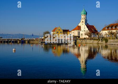 Church of St. George, moated castle at Lake Constance, Swabia, Bavaria, Germany Stock Photo