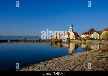 Church of St. George, moated castle at Lake Constance, Swabia, Bavaria, Germany Stock Photo