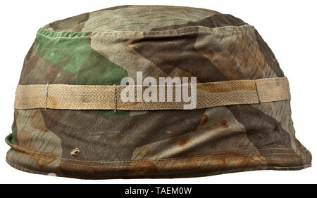 A steel helmet cover for paratroopers in splinter camouflage pattern Cover of imprinted cotton material, the exterior with splinter pattern camouflage and attachment strap for camouflage material, white interior, central size stamping '2', with strap. Obvious oxidation marks from a helmet. historic, historical, Air Force, branch of service, branches of service, armed service, armed services, military, militaria, air forces, object, objects, stills, clipping, clippings, cut out, cut-out, cut-outs, 20th century, Editorial-Use-Only Stock Photo