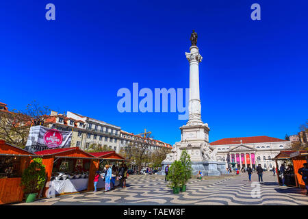 Lisbon, Portugal - March 27, 2018: Rossio square with spring Easter market and people Stock Photo