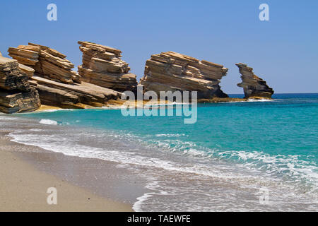 Triopetra, cliffs of platy sandstone on Crete in a turquoise sea Stock Photo