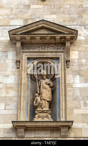 Statue of St. Augustine on the side of St. Stephens Basilica in Budapest, Hungary Stock Photo