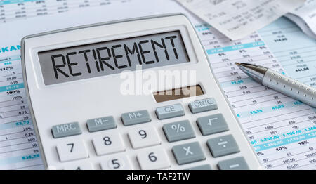A calculator with the word Retirement on the display Stock Photo