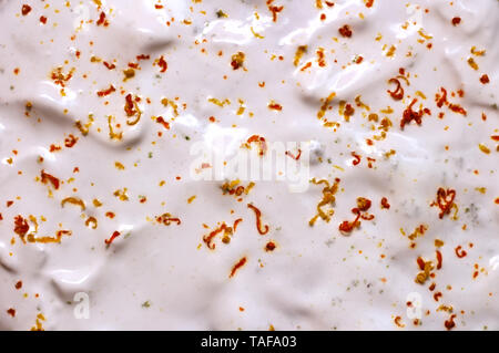 texture of butter cream with orange peel Stock Photo