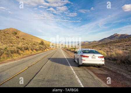 CALIFORNIA, USA - April 4, 2019: White KIA Optima parked on the roadside in California on a sunny morning. Stock Photo