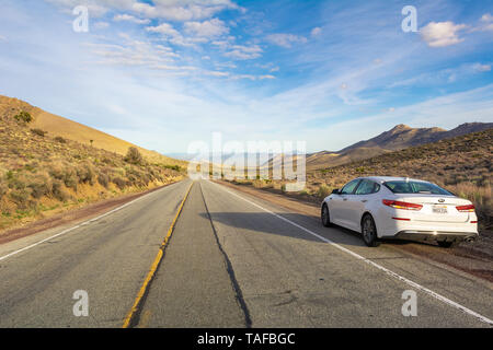 CALIFORNIA, USA - April 4, 2019: White KIA Optima parked on the roadside in California on a sunny morning. Stock Photo