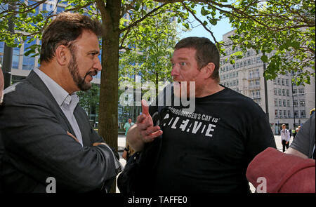 Manchester, UK. 24th May, 2019. Labour MP Afzal Khan is challenged during a student strike for climate change protest by a man asking 'why he had supported HS2', St Peters Square, Manchester. Credit: Barbara Cook/Alamy Live News Stock Photo