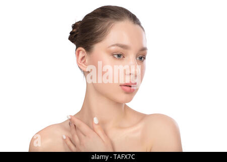 Beautiful young woman with clean perfect skin. Beauty portrait. Spa, skin care and wellness.