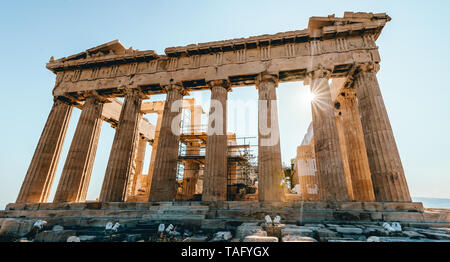 Sunbeams shine trough the Parthenon on Acropolis, Athens, Greece Stock Photo