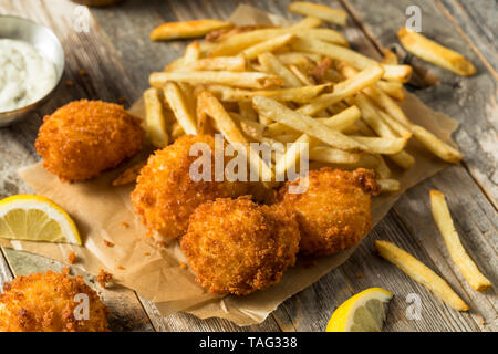 Homemade Deep Fried Scallops with French Fries Stock Photo - Alamy